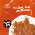 Ground gingerbread spice on white background with text "With cinnamon, anise and cloves" and "100% organic"