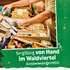 Person assembling gift boxes by hand with text "Carefully assembled by hand in the Waldviertel region"