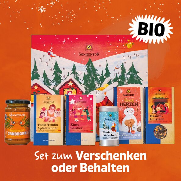 Sonnentor Fireplace gift box with tea, cookies, spices and fruit spread, organic, with text "Gift set to give or keep"