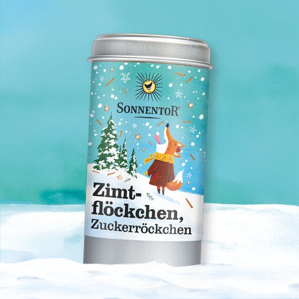 Sonnentor organic spice tin "Cinnamon, Sugar & Stardust" with winter illustration